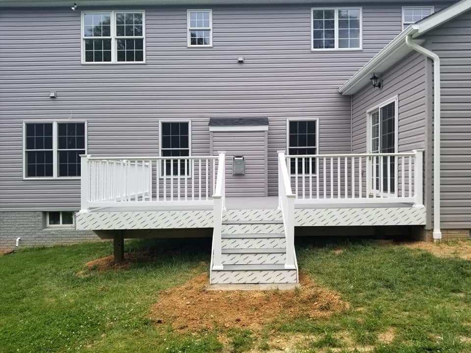 Newly completed deck with protective film still on the railing