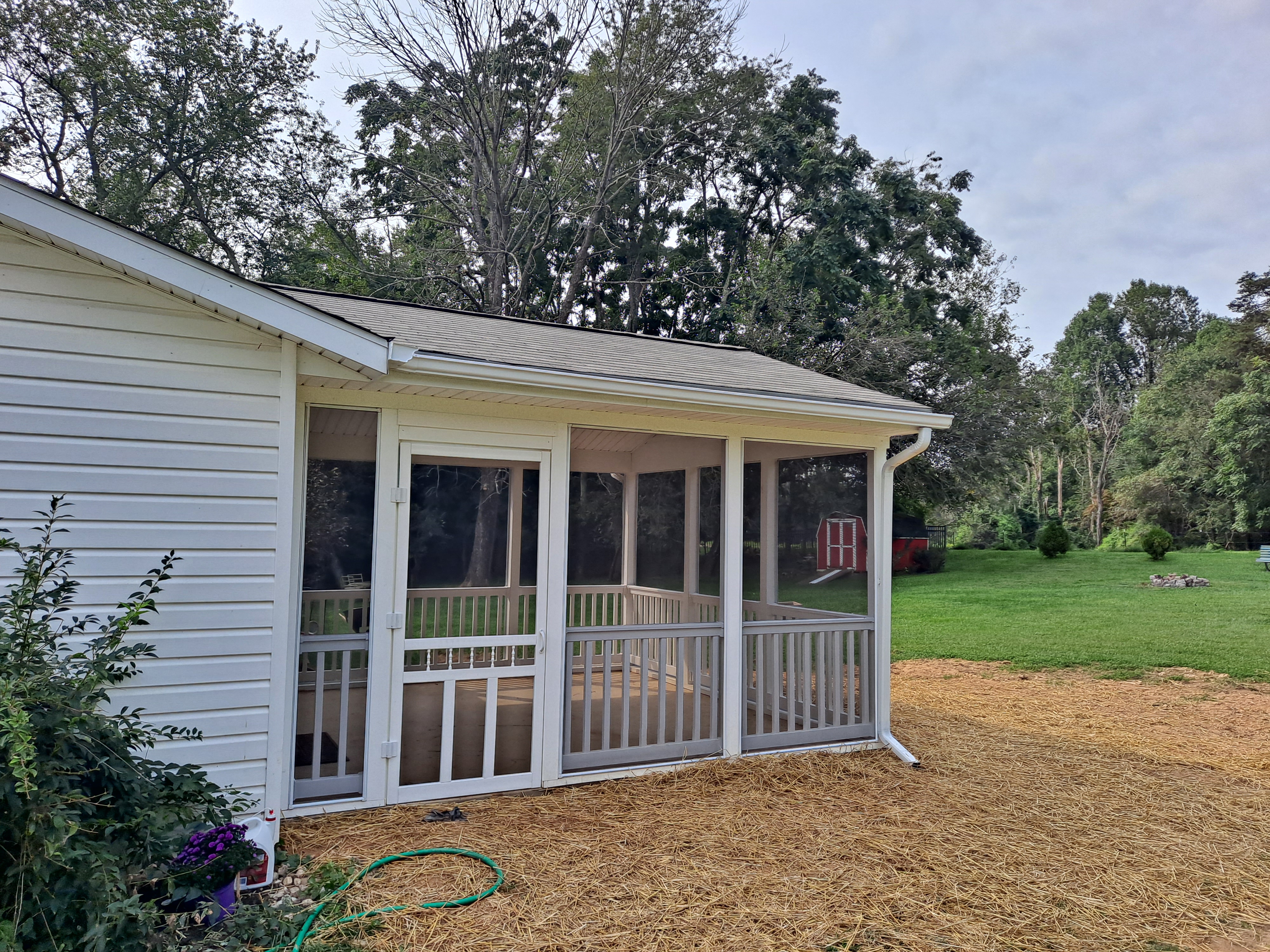 Screened porch addition, rear yard view