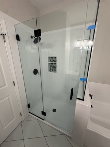 Bathroom remodel with new glass shower enclosure