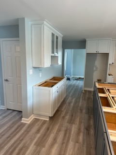 Kitchen remodel in progress with new cabinetry